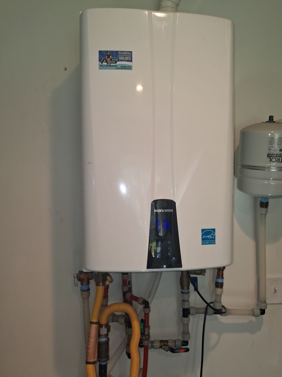 After the repair: Tankless Water Heater Maintenance and Leak Repair in Broken Arrow, finished work by Acts of Service Plumbing