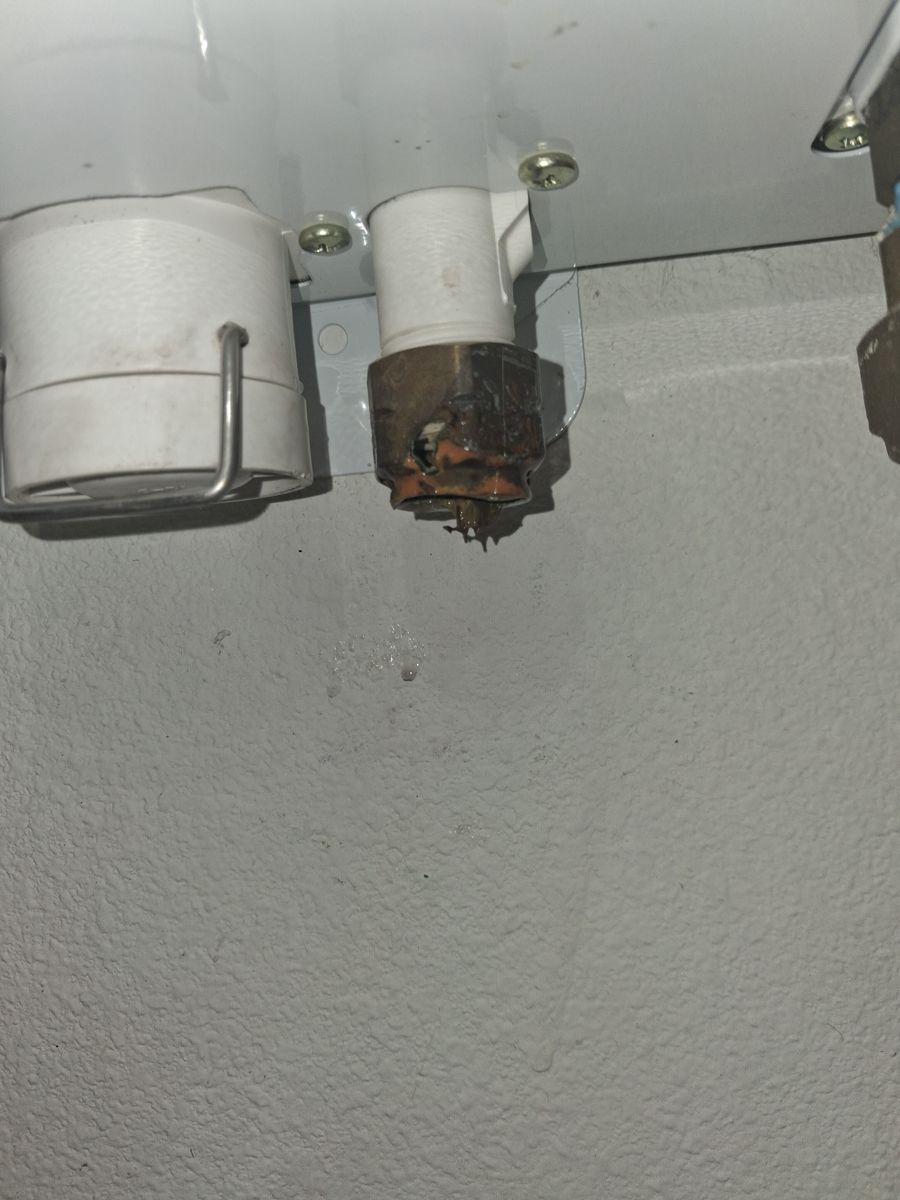 Before the repair: Tankless Water Heater Maintenance and Leak Repair in Broken Arrow, photographed on the job by Acts of Service Plumbing