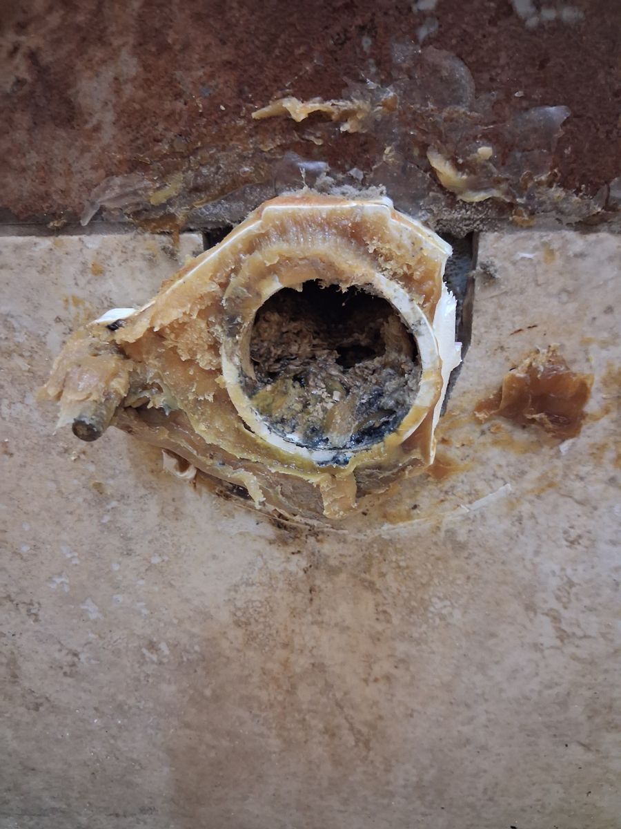 Before the repair: Urinal Backup and Flange Repair in Tulsa, photographed on the job by Acts of Service Plumbing